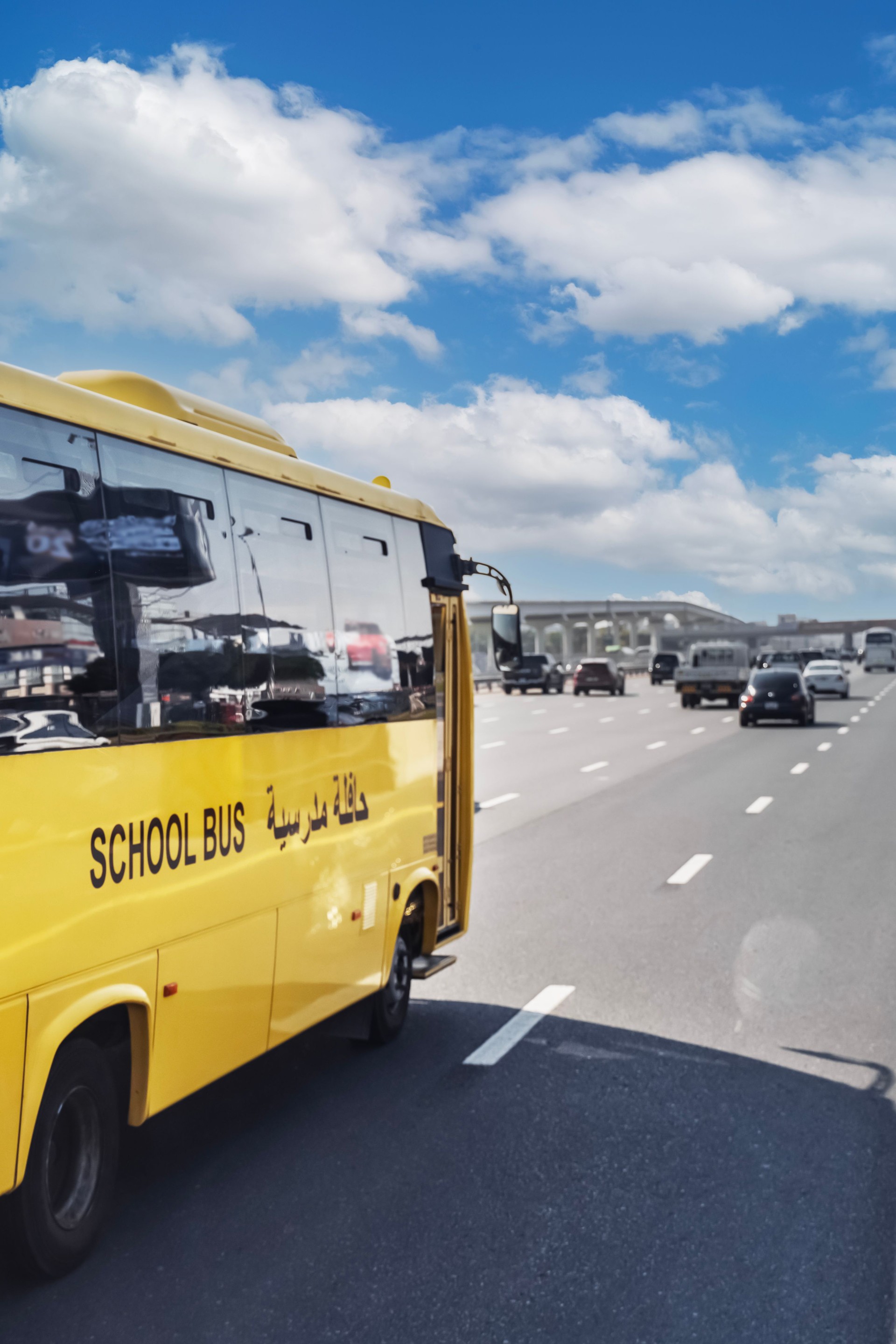 Dubai school bus, yellow arabic school bus. vertical